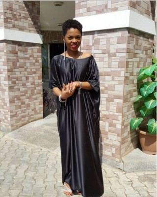Chidinma puts her radiance on fleek in flowing black gown. Photo: Chidinma/Instagram