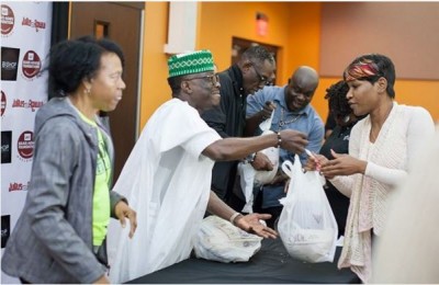 Julius Agwu donating turkeys to American families. Photo: Bishop Entertainment.