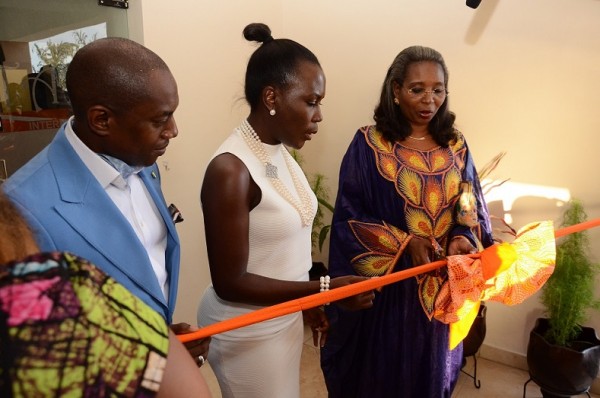 Mrs Ibukun Awosika cutting the ribbon at the House of Tara Corporate office launch
