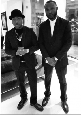 (Davido and his manager, Kamal Ajiboye)