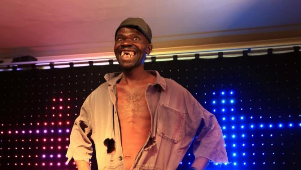 Mison Sere smiles after winning the 2015 edition of the Mr Ugly competition, in Harare, Saturday, Nov. 21.2015. Sere who controversially dethroned former Mr Ugly William Masvinu to scoop the top prize of $500 in a contest marked by allegations of cheating. Masvinu has had it relatively easy over the past 3 years when the contest struggled to draw more than 10 contestants. This year's competition attracted 35 contestants with organisers saying they were looking for people with natural ugliness. (AP Photo/Tsvangirayi Mukwazhi)