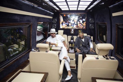 E-Money and Kcee in the new whip.