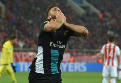 Giroud sends Arsenal to knock out stages of UCL. Photo: Getty Images
