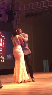 Seun Akindele and Mercel kissing on stage