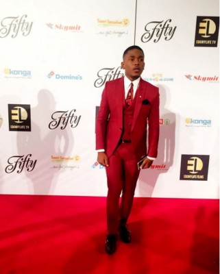 Timini Egbuson was the man of the night as he turned up in a red 3-piece suite for the premiere. Photo: Timini Egbuson/Instagram