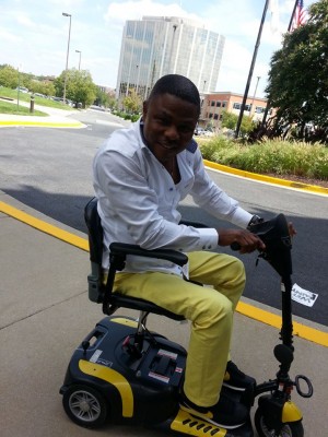 Yinka Ayefele on scooter