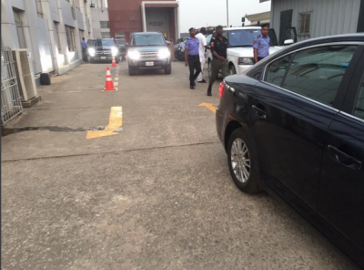 Idris Elba in white arriving Lagos for the premiere of 'Beast Of No Nation'.