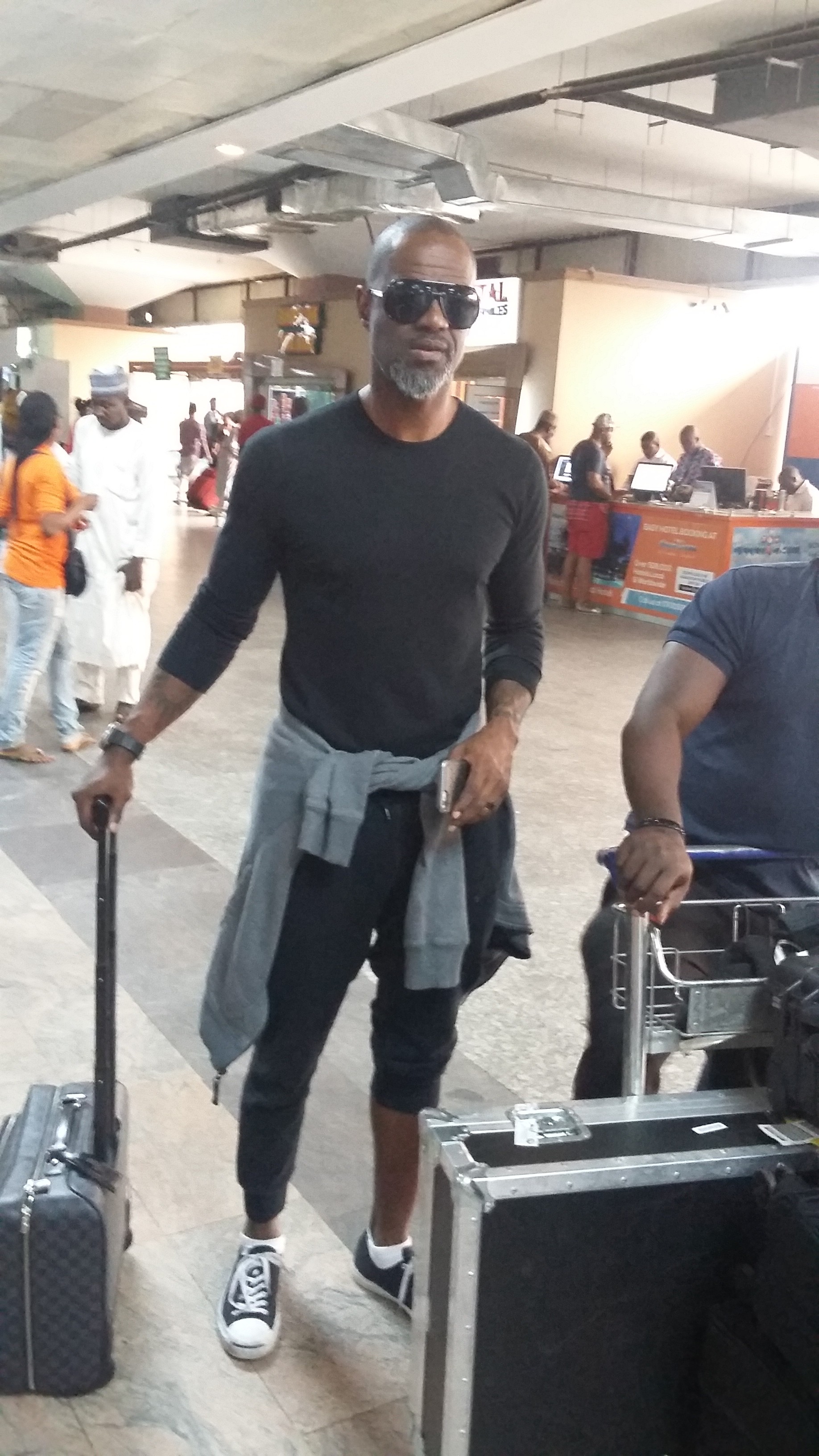 Brian McKnight arrives in Lagos.