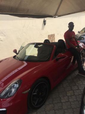 D'banj strikes a pose with his new whip.
