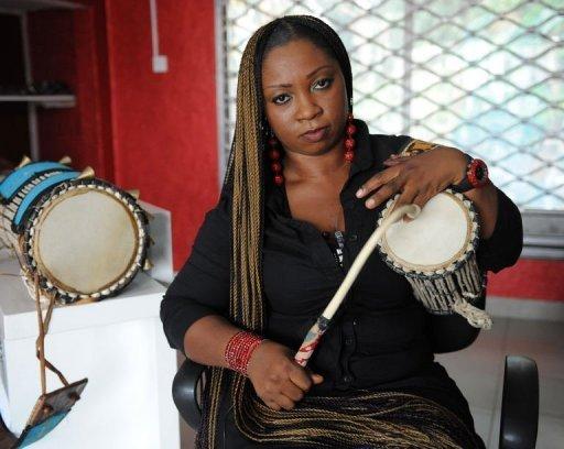 Talking drummer Aralola Olamuyiwa, popularly known as Ara, plays the talking drum during a rehearsal in Lagoson. The talking drum is a long way from dying, having now been incorporated into not only traditional music, but also African hip-hop and the songs of global stars such as Erykah Badu.