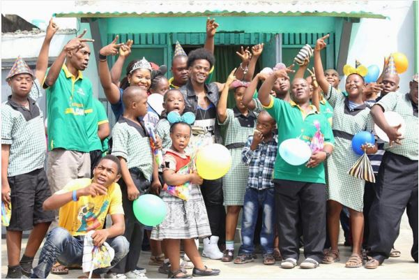 Korede Bello at the Down Syndrome Foundation of Nigeria. Photo: Metezy