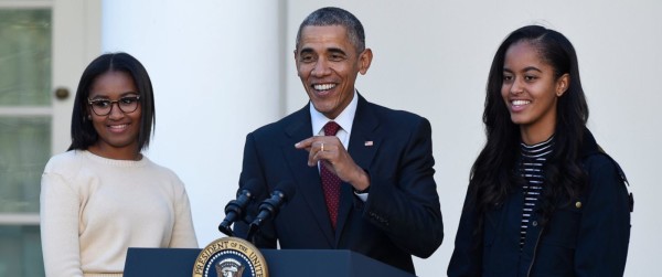 President Barack Obama, with his daughters, Sasha, and Malia