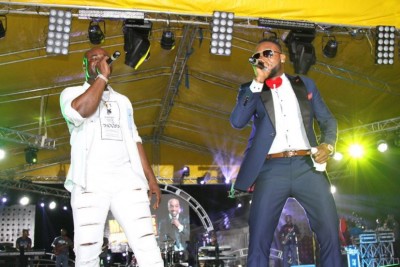 Kcee and Harrysong performing...
