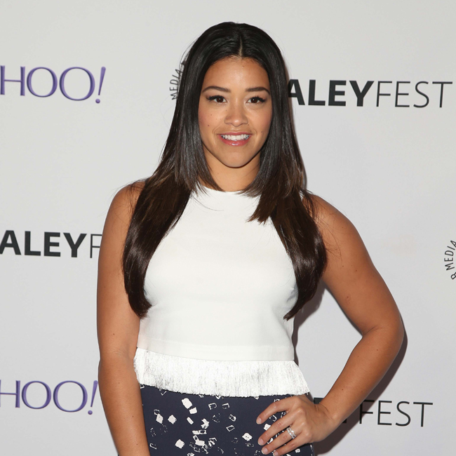 Gina Rodriguez feels pressured to look a certain way. Photo; Filed