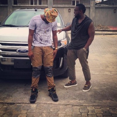 Skales and Timaya when he bought the car in 2014.