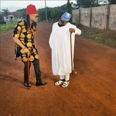 Timaya and Flavour on set.