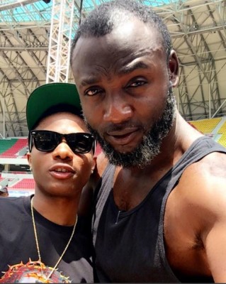 Davido's manager, Kamal Ajiboye and Wizkid in Congo today.