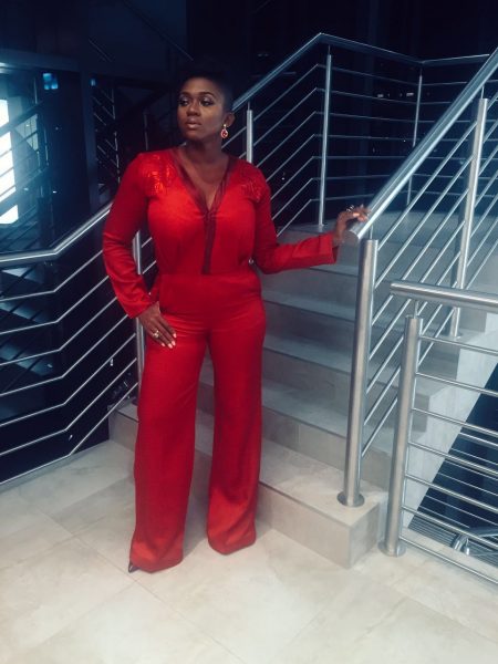 Waje in her red Samuel Noon jumpsuit
