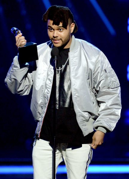 The Weeknd with his award. Photo:Kevin Winter/Getty Images