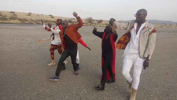 2face Idibia and Sauti Sol on set.