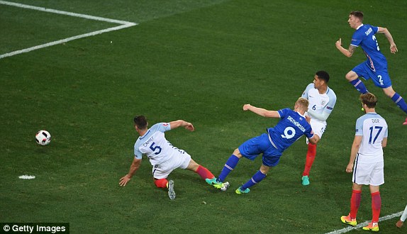Kolbeinn Sigthorsson (second left) scores Iceland's second goal against England