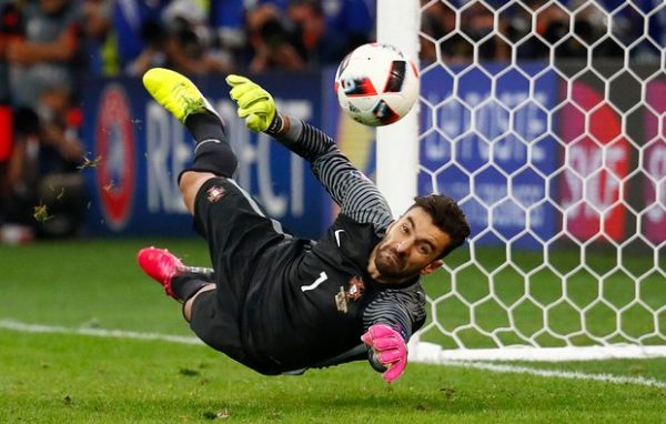 Rui Patricio saves Jakub Blaszczykowski penalty kick. Credit: Michael Dalder/Reuters