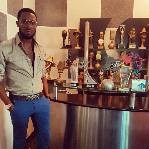 D'banj with his catalog of awards