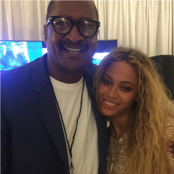 Father and daughter in warm embrace during Beyonce's Formation Tour