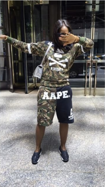 Tiwa throws dabs in Camo outfit