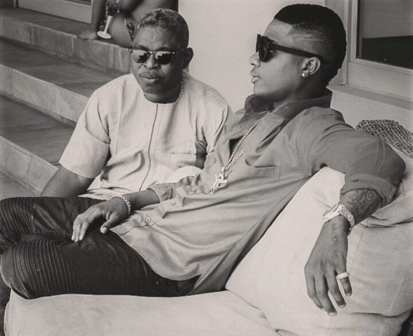 Wizkid and his manager, Sunday Are.