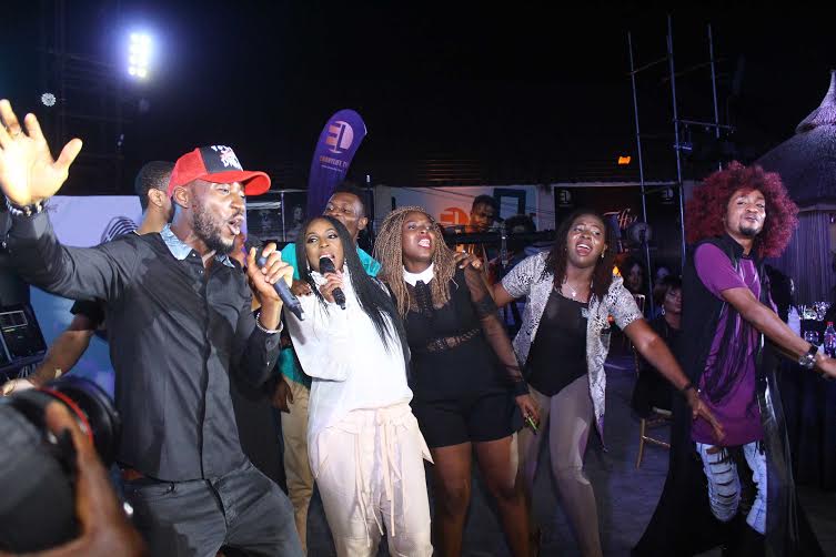 Mo Abudu and Denrele sing karaoke