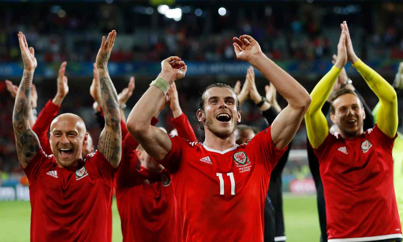 Wales players celebrate as they proceed to semis