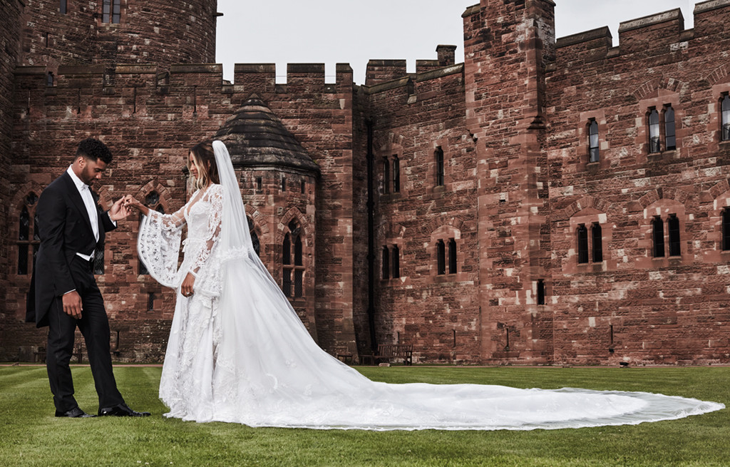 While Russell's suit was personally handcrafted by Giorgio Armani, Ciara donned a one-of-a kind Roberto Cavalli Couture wedding gown