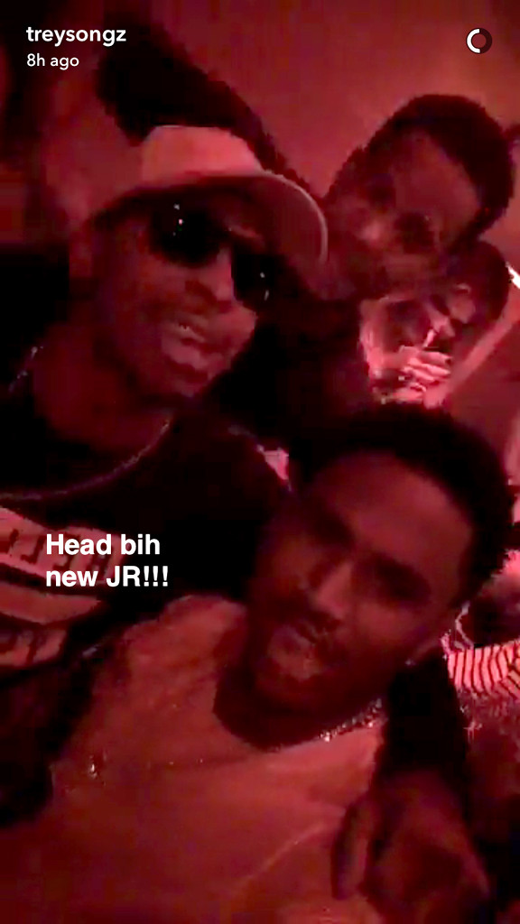 Khloe can be seen hanging in the background