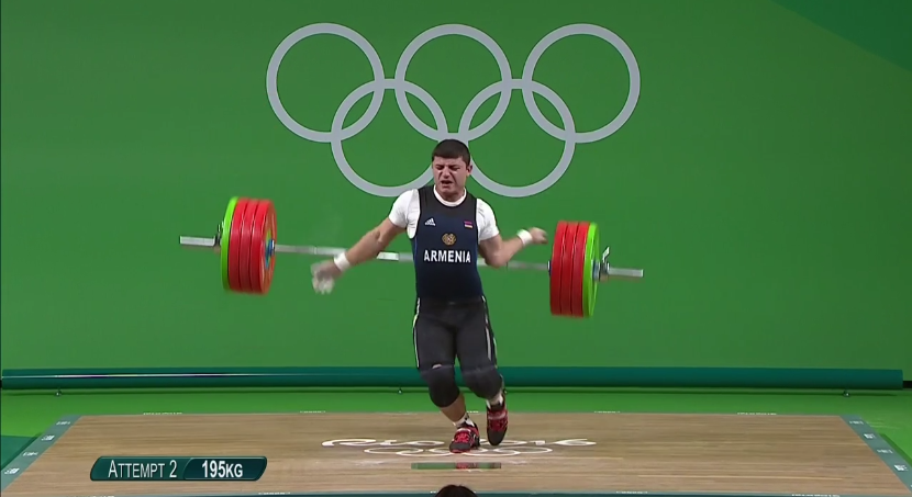 Armenian weightlifter's elbow explodes as he attempts to lift 430 pounds for the bronze medal.
