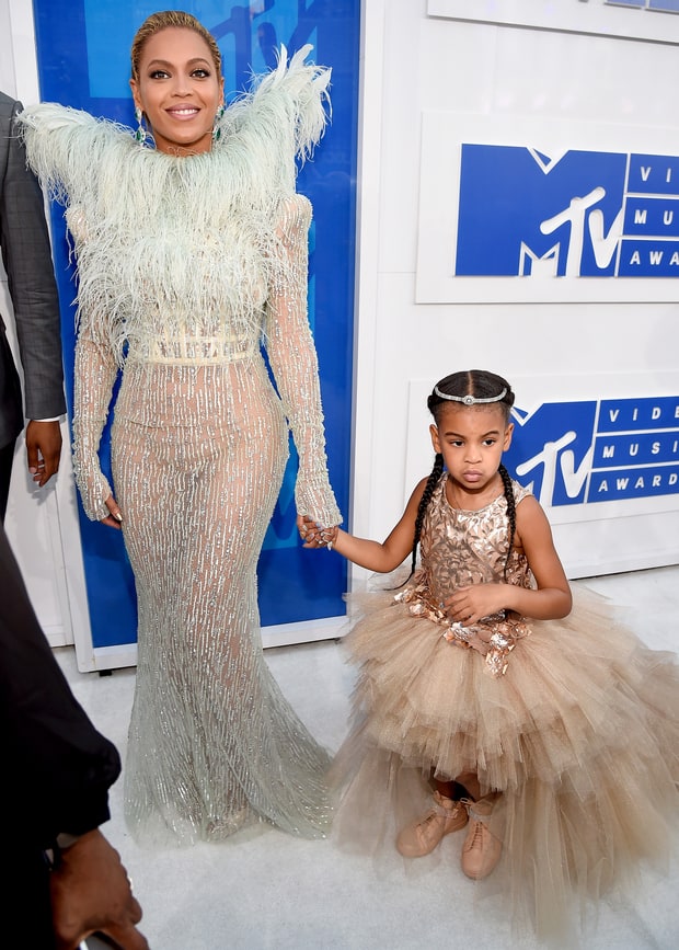 Beyonce walk the white carpet with daughter Blue Ivy. Credit: MTV