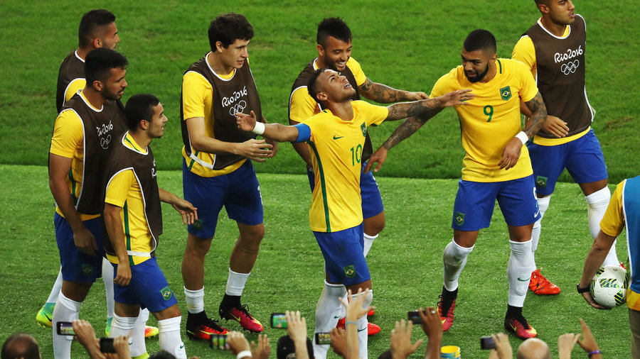 Neymar and teammates celebrate first goal against Germany. Photo: AP