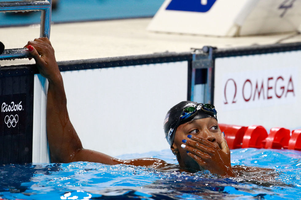 Simone Manuel reacts to becoming the first African American woman to win gold in an individual swimming event