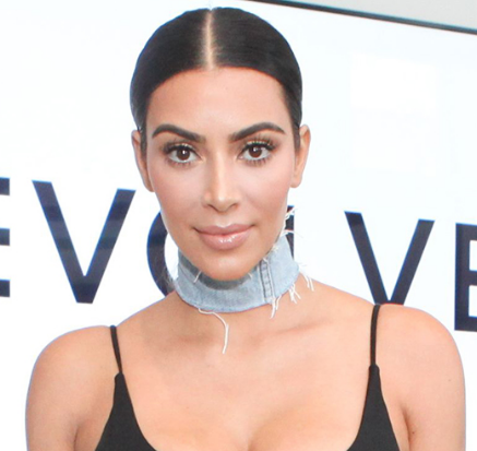 Kim Kardashian has fully embraced the denim choker trend