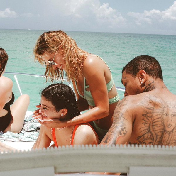 After presenting her with a Maybach coupe, Tyga also showed up for a beach cruise