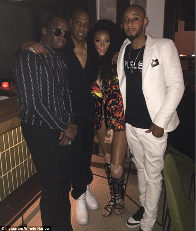 Winnie has a bevvy of A-list pals including Puff Daddy and Jay Z, pictured on her left