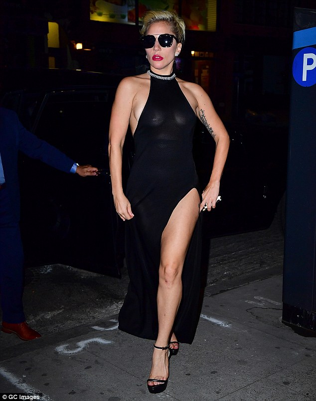 The barely-there dress allowed the star to show off her tattooed legs, torso and arms