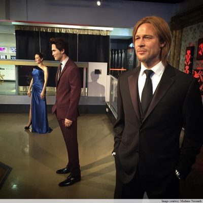 The wax figures of Brad Pitt and Angelina Jolie now showing Robert Patterson between them. Photo:Madame Tussauds