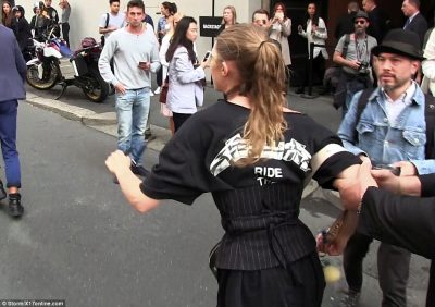 Still fuming, she tried to go after him, but was held back