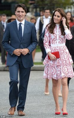 The duchess looked regal in this red and white dress