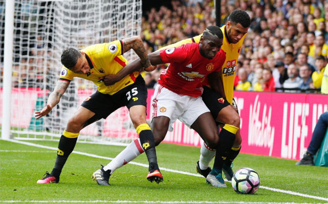 Paul Pogba compete with Watford players for ball during their clash in September. Credit: AP