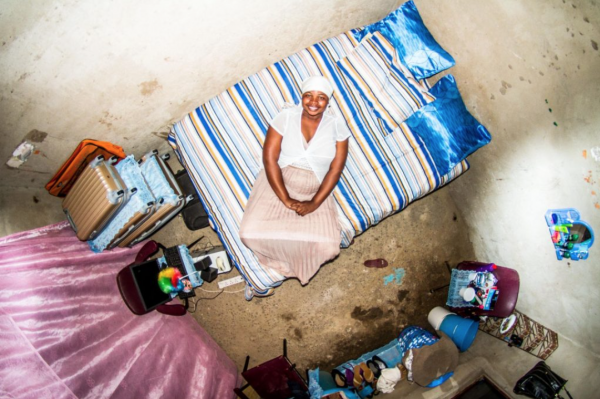 Ronia pictured in her bedroom in Chitungwiza, Zimbabwe (Photo: John Thackwray)