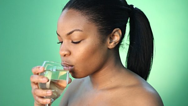 a lady drinking alcohol