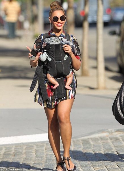Beyonce and baby Blue enjoy a stroll in the sun