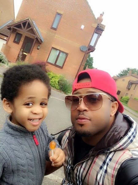 Mike Ezuruonye and his son